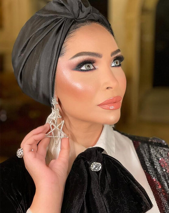 Noura Alkholy showcasing beauty and lifestyle inspiration in a serene Cairo setting